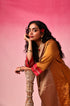 Kanaka Zari Tissue Kurta Set in Gold by Lavira